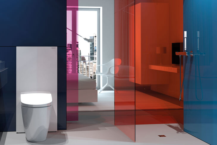 Hippes Badezimmer in knalligen Farben von Geberit. Im Vordergrund links befindet sich ein Dusch-WC, welches mit dem praktischen Monolith Sanitär-Modul kombiniert wurde. 