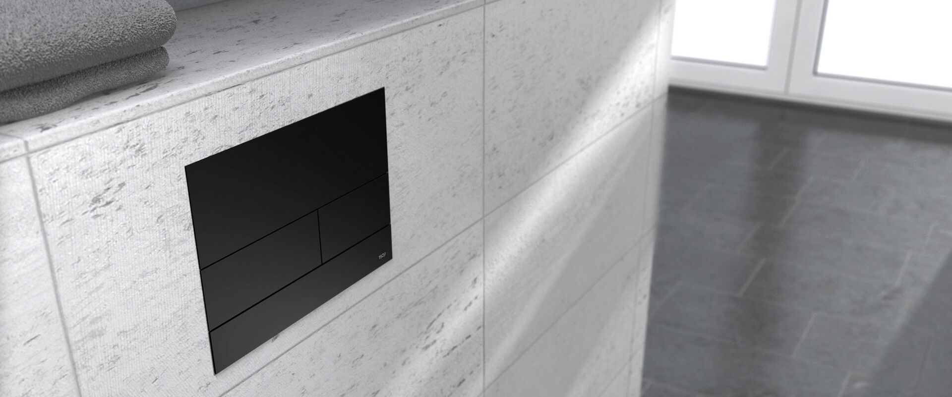 Drückerplatte fürs WC in schwarz veredelter Edelstahl aus der Designserie TECEsquare 2.
