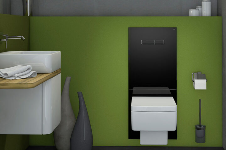 Ausschnitt auf das WC in einem Gästebad mit grünen Wänden: Auf einem innovativen TECElux WC-Terminal Sanitärmodul in schwarz wurde ein weißes WC installiert.