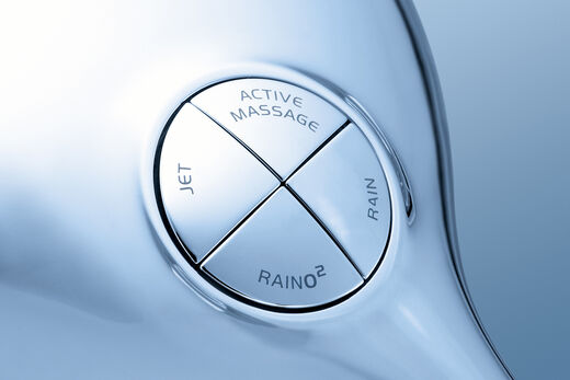 GROHE Power & Soul Nahaufnahme eines GROHE Power Soul Duschkopfs, auf dem verschiedene Einstellungen ausgewählt werden können. Active Massage, Rain, Raino2 und Jet.