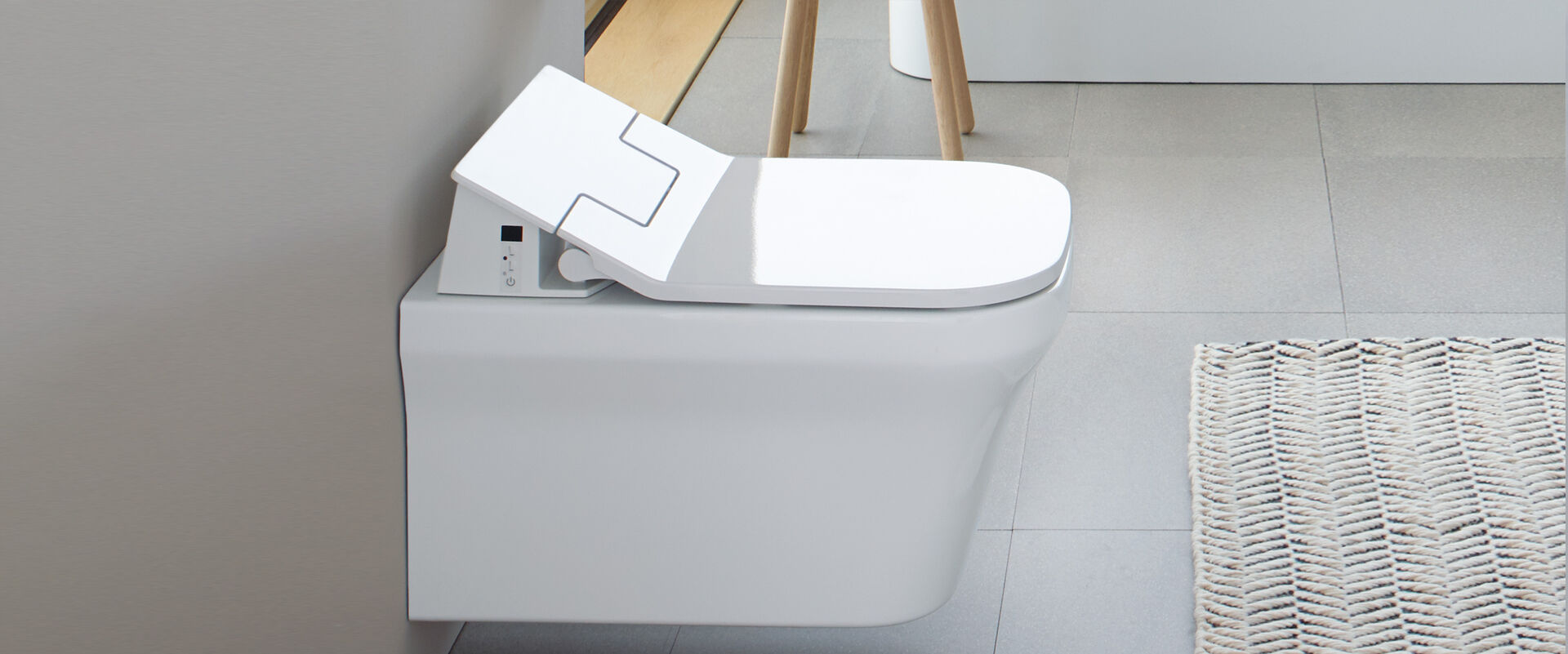 Der eleganten, dünne Slim Dusch-WC-Sitz der Serie SensoWash von Duravit in der Seitenansicht. 